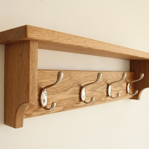 Wooden wall mounted coat rack with shelf