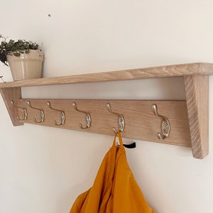 Wall coat rack with shelf entryway