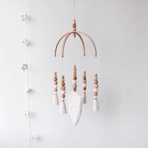 Macramé babymobiel voor wieg, boho kinderkamerinrichting, neutraal babyshowercadeau