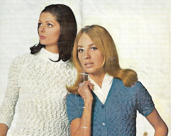 May include: Vintage knitting pattern featuring two women modeling knitted tops. The pattern is for "EIGHT CLASSICS FOR LADIES" and includes sizes 34, 36, 38, 40, and 42 inches. One woman wears a white textured sweater, and the other a blue cardigan.
