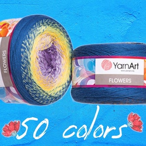 May include: Two spools of YarnArt Flowers yarn in shades of blue, yellow, purple, and orange. The yarn is labeled with the brand name and the word "FLOWERS". The image also includes the text "50 colors" in white script.