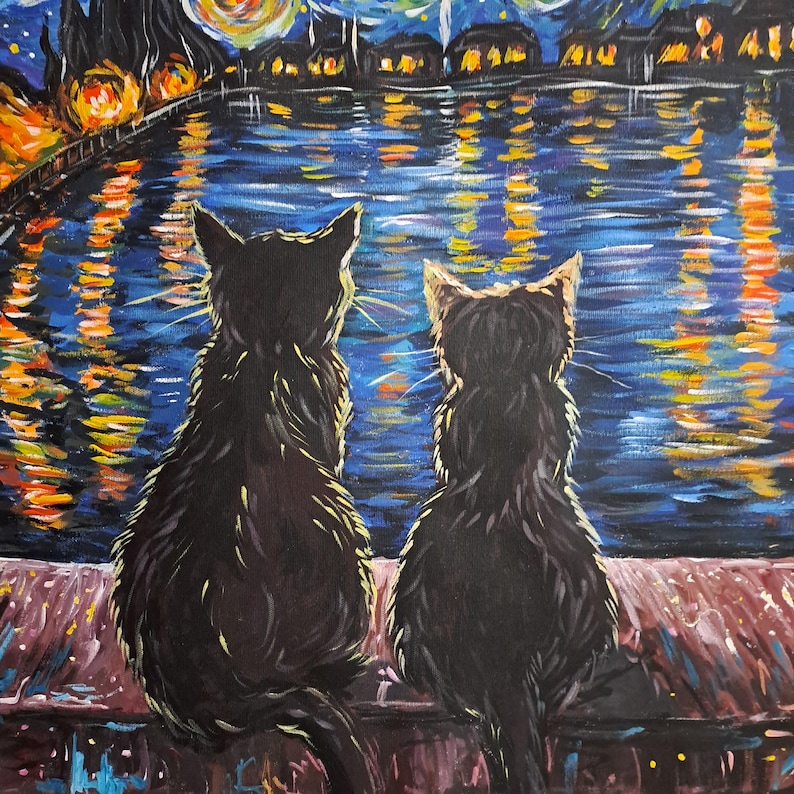 May include: Two black cats sit side-by-side on a ledge, looking out at a starry night sky reflected in a body of water. The water is painted in shades of blue and yellow, with twinkling lights reflecting on the surface.