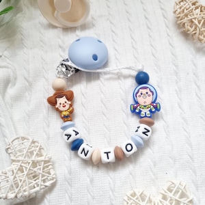 Attache tétine personnalisée garçon - Attache sucette Buzz et Woody – Cadeau naissance bébé