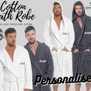 May include: Three hooded bathrobes in white and gray with the text "Personalized" at the bottom. The robes have pockets and are made of a soft, absorbent material. The robes are available in sizes S-XL.