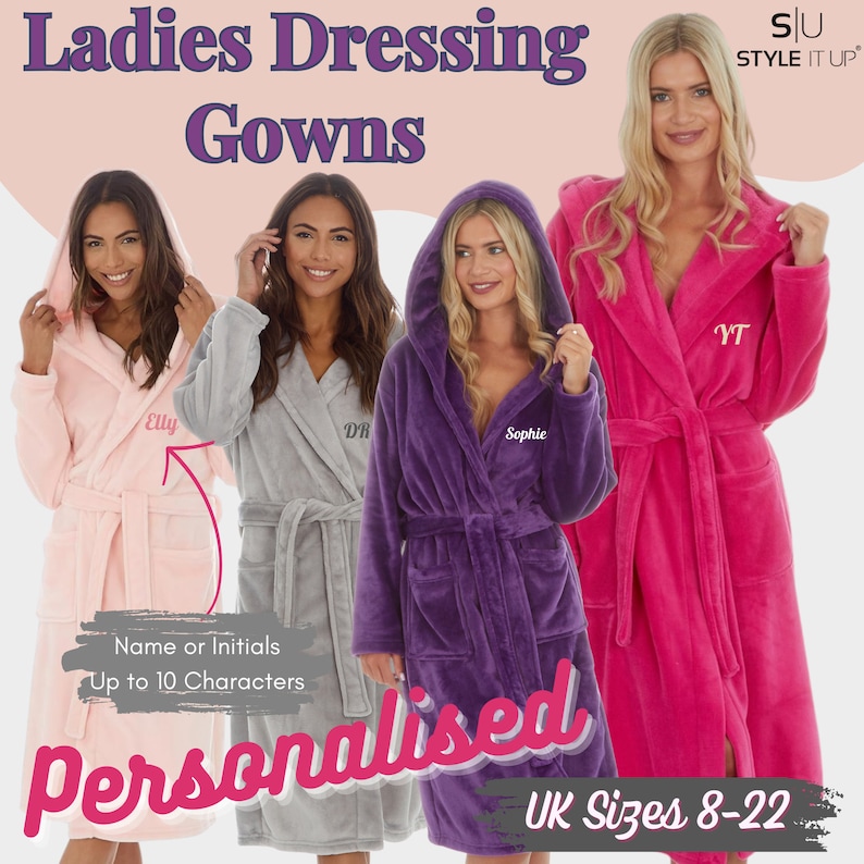 May include: Image of four hooded dressing gowns in pink, gray, purple, and fuchsia. Each robe has a matching belt and is personalized with a name or initials. The text reads "Ladies Dressing Gowns" and "Personalised."