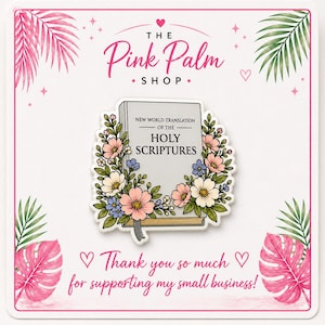 May include: A sticker featuring a book with the text "NEW WORLD TRANSLATION OF THE HOLY SCRIPTURES" surrounded by flowers. The sticker also includes the text "Thank you so much for supporting my small business!" and the shop name "The Pink Palm Shop."