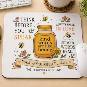 May include: A white mousepad with a motivational quote and a honey jar illustration. The text reads "Think Before You Speak", "Kind words are like honey", and "Your words reflect Christ". The design includes bees, flowers, and a sunflower.