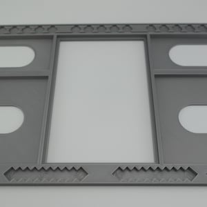 May include: A gray plastic frame with multiple slots for holding cards. The frame has a decorative border with a repeating pattern.
