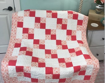 Pink And White Floral Quilt