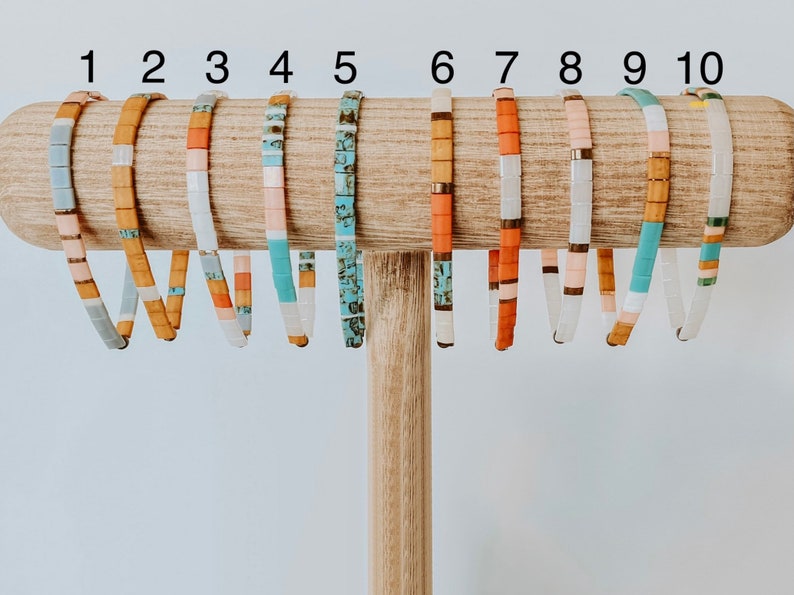 Tila bead bracelets made of colorful square glass beads and elastic.