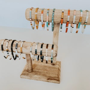 Tila bead bracelets made of colorful square glass beads and elastic.