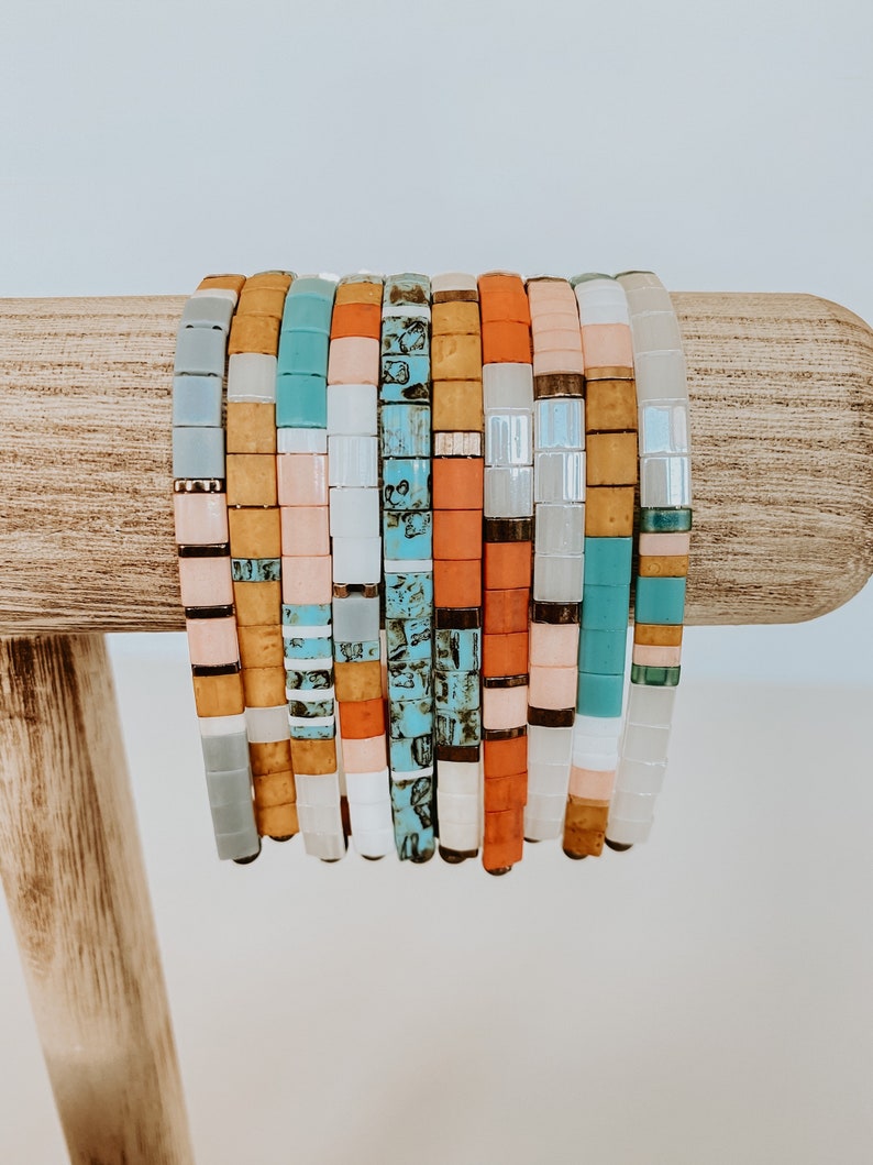 Tila bead bracelets made of colorful square glass beads and elastic.