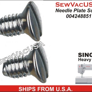 May include: Two shiny, silver needle plate screws. The screws have a slotted head and are designed for a sewing machine. The image includes the text "SEW VACUSA" and "Needle Plate Screw 004248851" and "SINGER Heavy Duty".