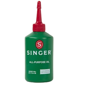 May include: A white ceramic mug with a black handle and the text "But First, Coffee" in a black, bold font. The mug is on a white surface.