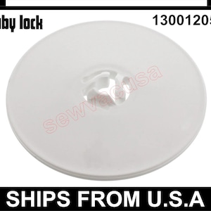 May include: White plastic sewing machine foot with a round shape and a center hole. The part number 130012053 is printed on the image.