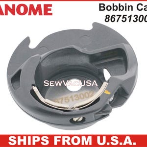 May include: A gray Janome bobbin case, model 867513002, with a silver-colored metal component. The text "SEWVACUSA" is visible on the case. The image is set against a red background with the word "JANOME" at the top.