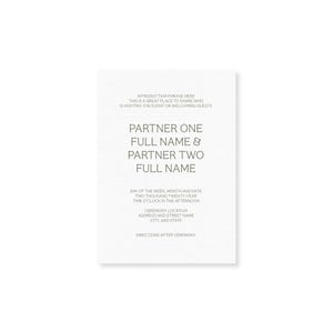May include: A white invitation card with text in a simple font. The text includes phrases like "Partner One Full Name & Partner Two Full Name" and "Ceremony Location". The card is designed for a wedding or similar event.