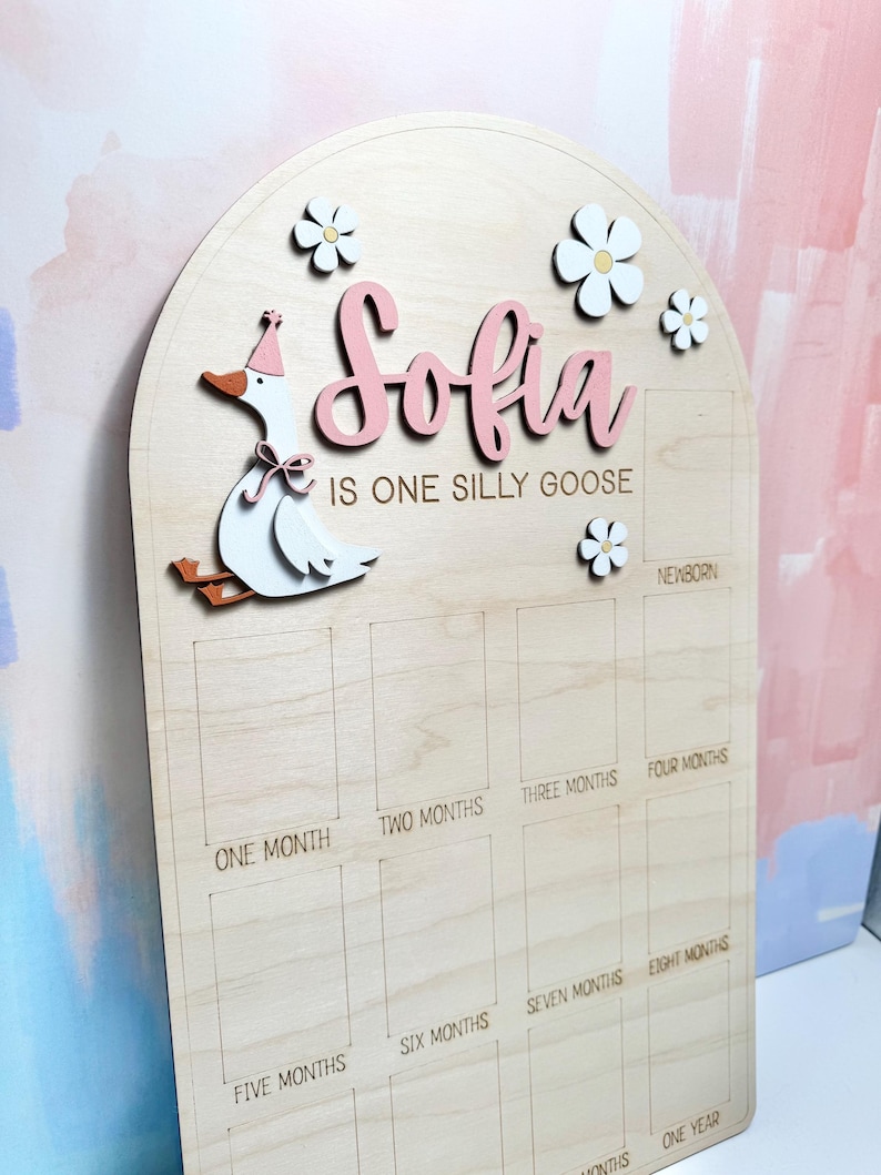 May include: A handmade wooden sign with the text "Welcome to our home" in a handwritten style. The sign is painted white with a distressed finish and a dark brown border. It is designed for indoor or outdoor use.