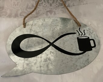Metal Conversation bubble with black infinity coffee sign