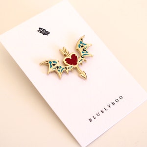 Heart & Wings Pin - Gold Hard Enamel Lapel Pin Fantasy Book DnD Arrow