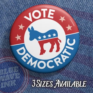 May include: A red, white, and blue button with the text "VOTE DEMOCRATIC" and a donkey silhouette. The donkey has five stars on its side.
