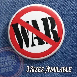 May include: A round button with a white background and the word "WAR" in bold black letters, crossed out by a red diagonal line. The button is surrounded by a red border. The text "3 SIZES AVAILABLE" is below the button.