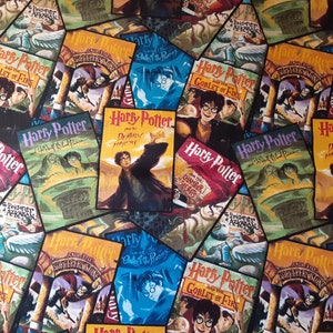 May include: A colorful fabric with a repeating pattern of Harry Potter book covers. The covers feature different titles from the series, including "Harry Potter and the Sorcerer's Stone", "Harry Potter and the Chamber of Secrets", "Harry Potter and the Prisoner of Azkaban", "Harry Potter and the Goblet of Fire", "Harry Potter and the Order of the Phoenix", "Harry Potter and the Half-Blood Prince", and "Harry Potter and the Deathly Hallows".