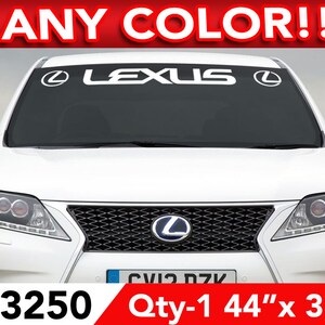 May include: White Lexus car with a black grille and a white windshield banner that says "LEXUS" with the Lexus logo on either side. The banner is 44 inches by 3 inches. The product number is #3250 and the quantity is 1.