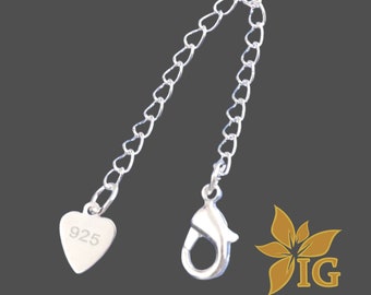 May include: Silver extender chain with a heart-shaped tag marked "925" and a lobster clasp.