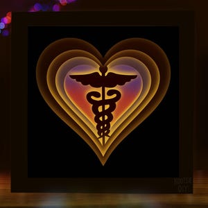 May include: A layered paper art piece featuring a heart shape with a medical symbol at the center. The heart design has multiple layers with a gradient of colors, from yellow to orange and purple. The medical symbol is a dark silhouette.