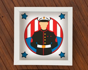 May include: A white frame with a red, white, and blue circle inside. The circle has a silhouette of a person in a military uniform with a hat. There are stars in the corners of the frame.