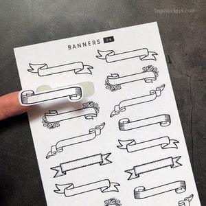 May include: A sheet of black and white printable stickers featuring 12 different banner designs. The sheet is labeled "BANNERS 06".