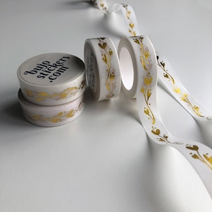 Washitape goudfolie • Bloemmotief in bladgoud op witte achtergrond • 15 mm x 10 m • bujostickers.com 024