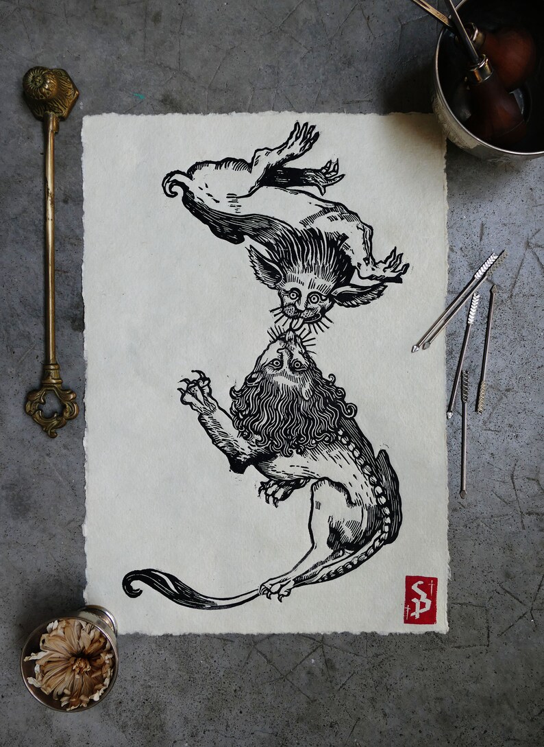 May include: Black and white woodcut print of a lion and a mythical creature with a long tail and large ears. The lion is facing the creature, and the creature is facing the viewer. The print is signed "SP" in the lower right corner.