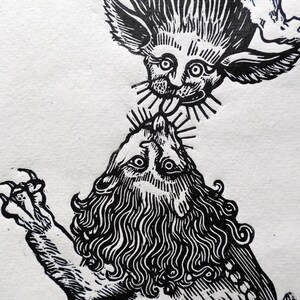 May include: Black and white woodcut print of a winged creature with a long tongue licking the head of a lion.
