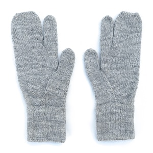 May include: A pair of gray knit gloves with a split-toe design. The gloves are made of a textured, heathered yarn and feature a ribbed cuff. The thumb is separated from the other fingers.