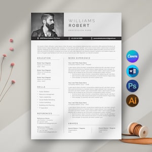 May include: A professional resume template with the name "WILLIAMS ROBERT" and the profession listed as "PROFESSION HERE." The resume includes sections for education, work experience, skills, references, and awards. The resume is designed for use with Canva, Word, Photoshop, and Illustrator.