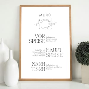 May include: A framed menu with a minimalist design. The menu features the word "MENU" at the top, followed by sections for starters, main courses, and dessert. The text is in black against a white background, with a wooden frame.