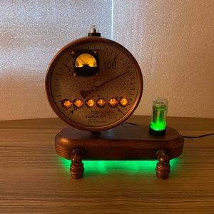 Vintage pressure gauge with nixie clock