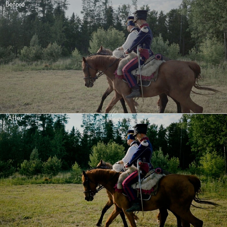 May include: Two riders on horseback, dressed in historical military uniforms, ride across a grassy field. The horses are brown, and the riders wear blue and red jackets with black hats. The scene is set against a backdrop of trees.