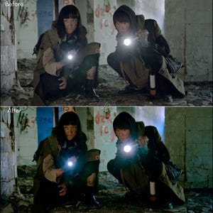 May include: Two people crouch in a dimly lit, graffiti-covered room, each holding a lit flashlight. They wear hooded jackets and dark clothing, with backpacks visible. The image has a before and after effect, showing a color adjustment.
