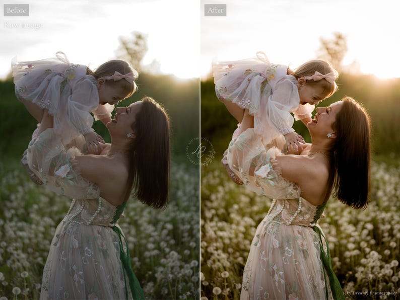 May include: A woman holding a young child in a field of white flowers. The woman wears a light-colored dress with floral embroidery and a green sash. The child is wearing a white dress with a pink bow. The image is bathed in warm sunlight.