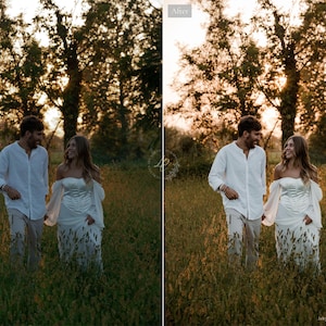 May include: A couple walks through a field of tall grass at sunset. The woman wears a white off-the-shoulder dress with long sleeves. The man wears a white button-down shirt and light-colored pants. The image is warm-toned.