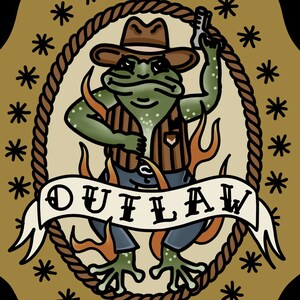 May include: A cartoon illustration of a frog wearing a cowboy hat, vest, and jeans. The frog is holding a gun and is surrounded by flames. The word "OUTLAW" is written on a banner below the frog.