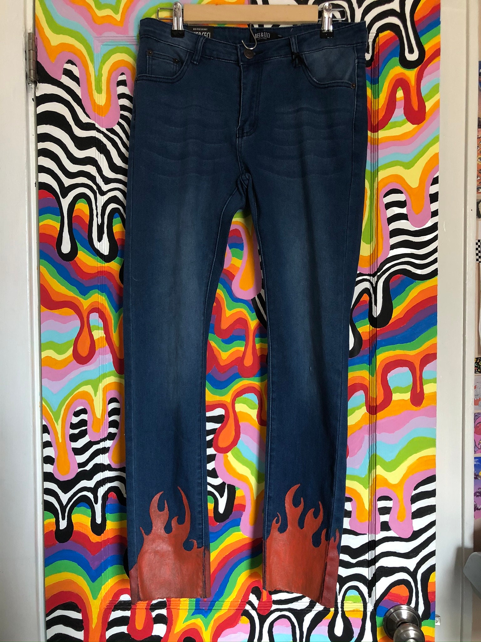 Flames painted on jeans sales
