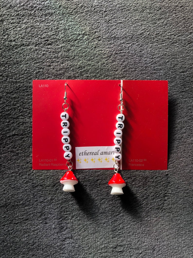 handmade trippy smiley pin earrings!