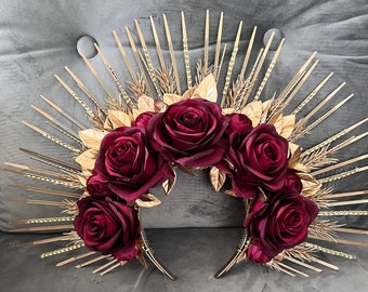 Gold crown with dark red roses