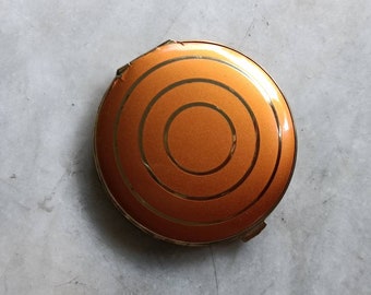 Art Deco orange powder compact