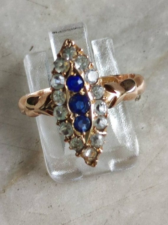Victorian 9ct ring set with synthetic sapphires and diamonds.