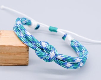 Blue and white adjustable paracord strap